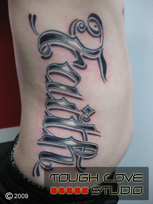Faith Rib Tattoo