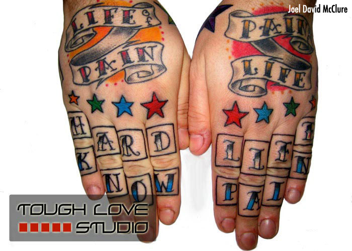 Colorful hand tattoos