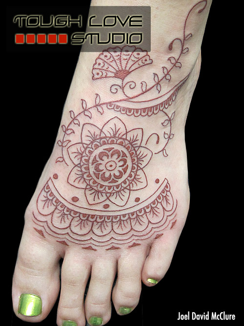 Henna-style foot tattoo